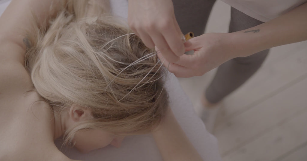 Red Light Scalp Massager — in use