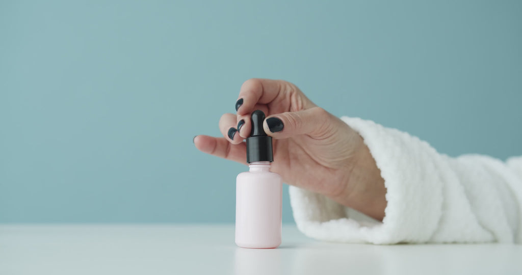 Vitamin C + HA Facial Serum — in use